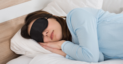 woman-sleeping-with-sleep-mask
